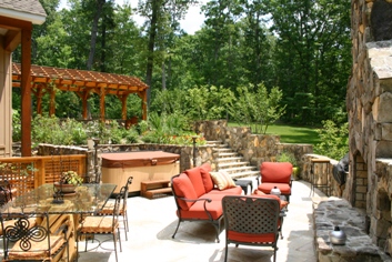 Outdoor room with stone fireplace