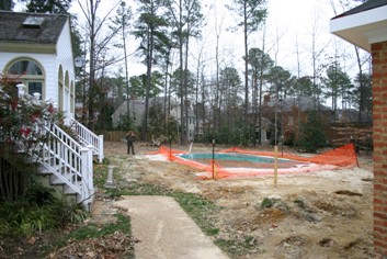 Fiberglass Swimming Pool with a Brick Deck Before