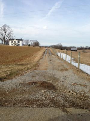 Here is the driveway as it exists.  The fence to the right can moved further away from the driveway if needed. 