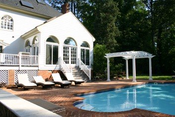 Swimming pool, brick pool deck and Walpole Woodworkers Pergola