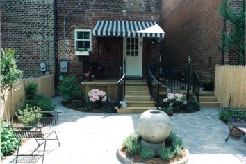 Small Yard with Pavers and Fountain