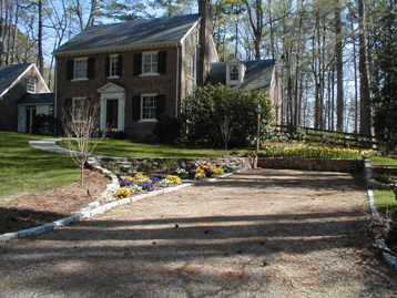 Parking Area with Stone Wall, Steps and Driveway Edge